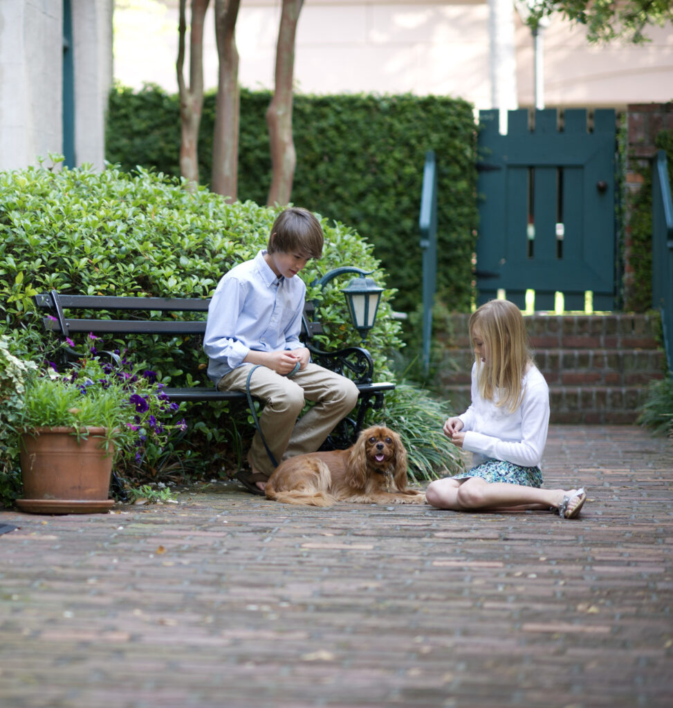 kids with a dog